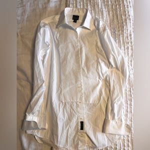 White mens tuxedo French cuff shirt.